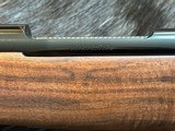 NEW WINCHESTER MODEL 70 SUPER GRADE 300 WIN MAG 26