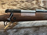 NEW WINCHESTER MODEL 70 SUPER GRADE 300 WIN MAG 26