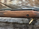 NEW WINCHESTER MODEL 70 SUPER GRADE 300 WIN MAG 26