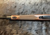 NEW WINCHESTER MODEL 70 SUPER GRADE 300 WIN MAG 26