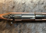 NEW WINCHESTER MODEL 70 SUPER GRADE 300 WIN MAG 26