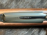 NEW WINCHESTER MODEL 70 SUPER GRADE 300 WIN MAG 26