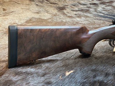 NEW WINCHESTER MODEL 70 SUPER GRADE 300 WIN MAG 26