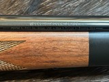 NEW WINCHESTER MODEL 70 SUPER GRADE 300 WIN MAG 26