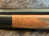NEW WINCHESTER MODEL 70 SUPER GRADE 300 WIN MAG 26