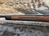 NEW WINCHESTER MODEL 70 SUPER GRADE 300 WIN MAG 26