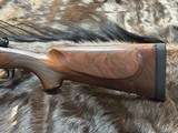 NEW WINCHESTER MODEL 70 SUPER GRADE 300 WIN MAG 26