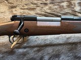 NEW WINCHESTER MODEL 70 SUPER GRADE 300 WIN MAG 26