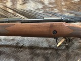NEW WINCHESTER MODEL 70 SUPER GRADE 300 WIN MAG 26