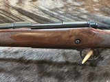 NEW WINCHESTER MODEL 70 SUPER GRADE 300 WIN MAG 26