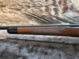 NEW WINCHESTER MODEL 70 SUPER GRADE 300 WIN MAG 26