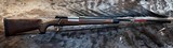 NEW WINCHESTER MODEL 70 SUPER GRADE 300 WIN MAG 26