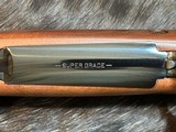 NEW WINCHESTER MODEL 70 SUPER GRADE 300 WIN MAG 26