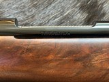 NEW WINCHESTER MODEL 70 SUPER GRADE 300 WIN MAG 26