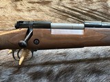 NEW WINCHESTER MODEL 70 SUPER GRADE 300 WIN MAG 26