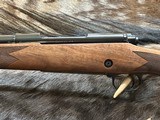 NEW WINCHESTER MODEL 70 SUPER GRADE 300 WIN MAG 26