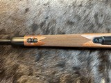 NEW WINCHESTER MODEL 70 SUPER GRADE 300 WIN MAG 26