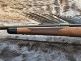 NEW WINCHESTER MODEL 70 SUPER GRADE 300 WIN MAG 26