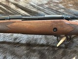 NEW WINCHESTER MODEL 70 SUPER GRADE 300 WIN MAG 26