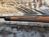 NEW WINCHESTER MODEL 70 SUPER GRADE 300 WIN MAG 26