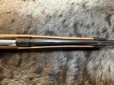 NEW WINCHESTER MODEL 70 SUPER GRADE 300 WIN MAG 26