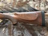 NEW WINCHESTER MODEL 70 SUPER GRADE 300 WIN MAG 26