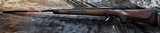 NEW WINCHESTER MODEL 70 SUPER GRADE 300 WIN MAG 26