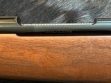 NEW WINCHESTER MODEL 70 SUPER GRADE 300 WIN MAG 26