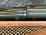 NEW WINCHESTER MODEL 70 SUPER GRADE 300 WIN MAG 26