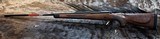 NEW WINCHESTER MODEL 70 SUPER GRADE 300 WIN MAG 26