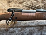 NEW WINCHESTER MODEL 70 SUPER GRADE 300 WIN MAG 26