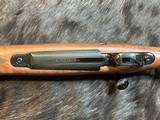 NEW WINCHESTER MODEL 70 SUPER GRADE 300 WIN MAG 26