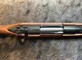 NEW WINCHESTER MODEL 70 SUPER GRADE 300 WIN MAG 26
