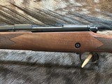 NEW WINCHESTER MODEL 70 SUPER GRADE 300 WIN MAG 26
