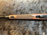 NEW WINCHESTER MODEL 70 SUPER GRADE 300 WIN MAG 26