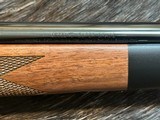 NEW WINCHESTER MODEL 70 SUPER GRADE 300 WIN MAG 26