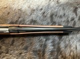NEW WINCHESTER MODEL 70 SUPER GRADE 300 WIN MAG 26