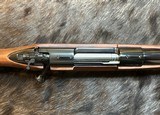 NEW WINCHESTER MODEL 70 SUPER GRADE 300 WIN MAG 26