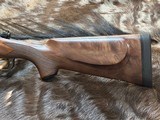 NEW WINCHESTER MODEL 70 SUPER GRADE 300 WIN MAG 26