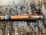 NEW WINCHESTER MODEL 70 SUPER GRADE 300 WIN MAG 26