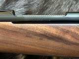 NEW WINCHESTER MODEL 70 SUPER GRADE 300 WIN MAG 26