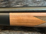 NEW WINCHESTER MODEL 70 SUPER GRADE 300 WIN MAG 26