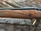 NEW WINCHESTER MODEL 70 SUPER GRADE 300 WIN MAG 26