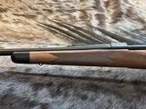 NEW WINCHESTER MODEL 70 SUPER GRADE 300 WIN MAG 26