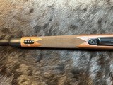 NEW WINCHESTER MODEL 70 SUPER GRADE 300 WIN MAG 26
