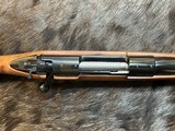 NEW WINCHESTER MODEL 70 SUPER GRADE 300 WIN MAG 26