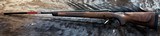 NEW WINCHESTER MODEL 70 SUPER GRADE 300 WIN MAG 26