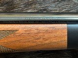 NEW WINCHESTER MODEL 70 SUPER GRADE 300 WIN MAG 26