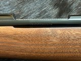 NEW WINCHESTER MODEL 70 SUPER GRADE 300 WIN MAG 26