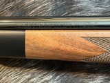 NEW WINCHESTER MODEL 70 SUPER GRADE 300 WIN MAG 26